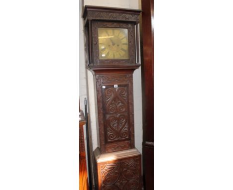 A Victorian oak longcase clock with brass face inscribed ‘Thomas White Fairford’