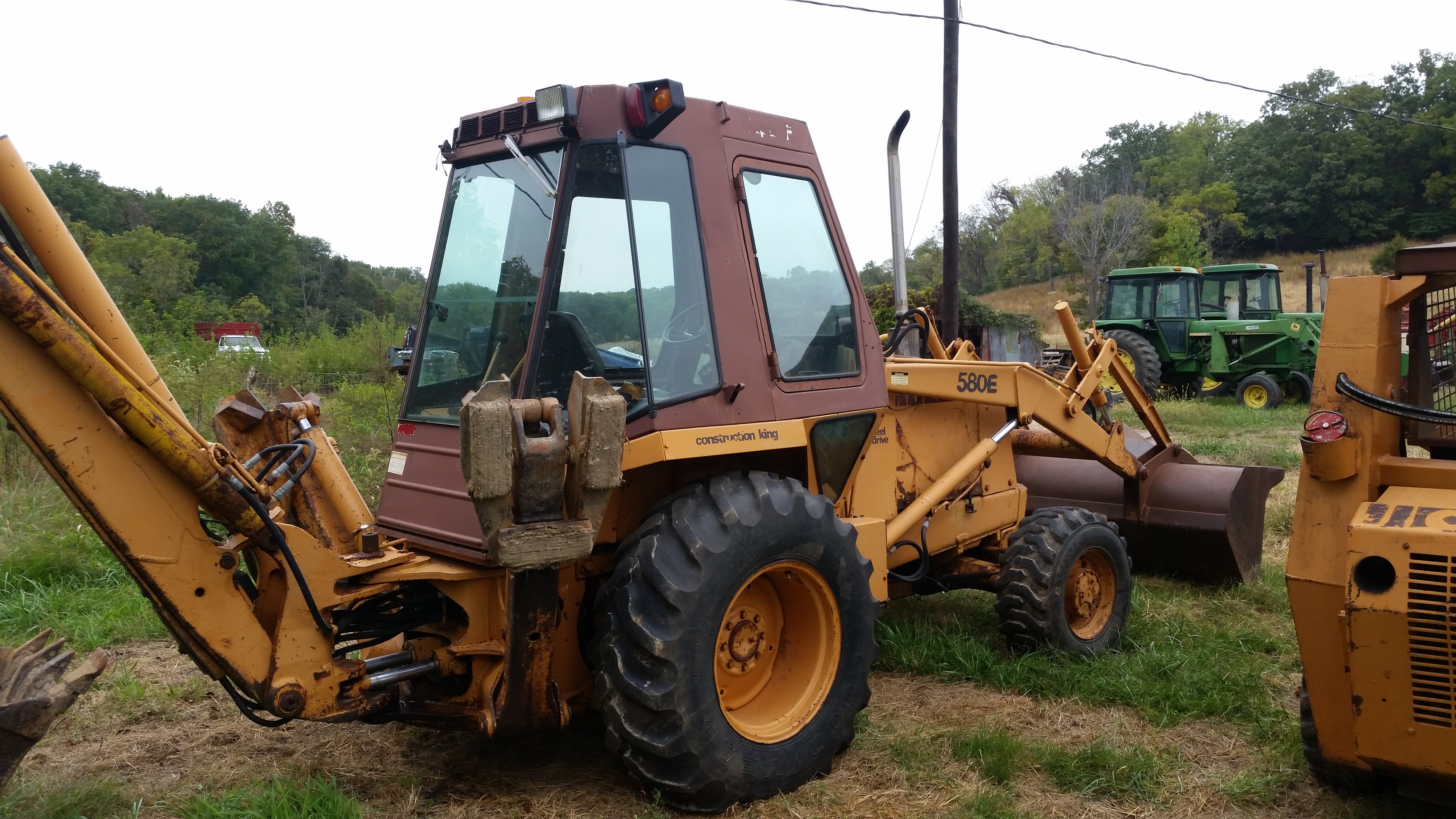 Case 580E backhoe 4WD, extendahoe, thumb