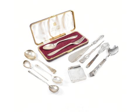 A collection of hallmarked silver and white metal flatware. The lot to include a Colibri monogas lighter. The lighter having 