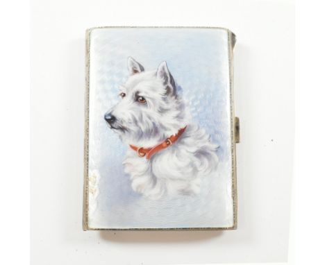 A George V hallmarked silver and enamel cigarette case. The cigarette case having an enameled picture of West Highland Terrie