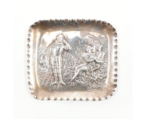 A Georgian hallmarked silver repousse trinket dish / pin tray. The dish having a central scene depicting two female figures s