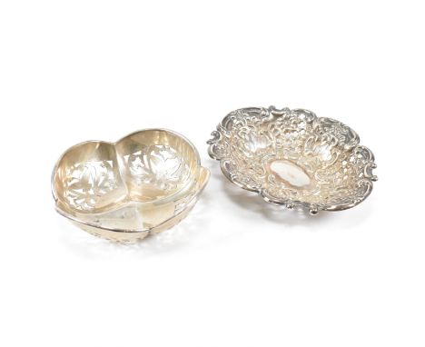 Two hallmarked silver bon bon dishes. The bon bon or trinket dishes both having pierced designs with one being Victorian and 