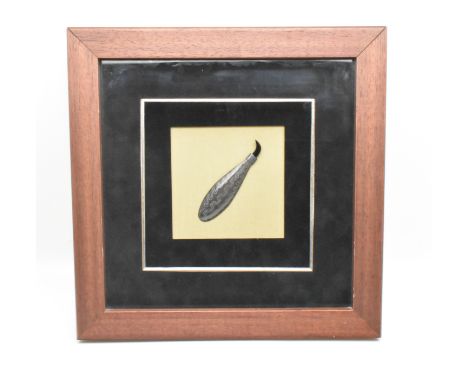 A framed white metal and enamel tribal tool.&nbsp;The tool having enamel detailing and etched geometric pattern. The tribal a