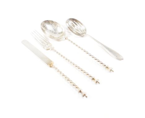 A collection of silver flatware. The silver to include a spoon fork and knife having fancy twisted handles with bubble decora