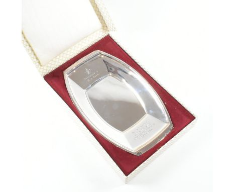 A 1960's hallmarked silver trinket dish. The dish being inscribed 'Presented to M.A Chard By the directors of W.D & H.O Wills