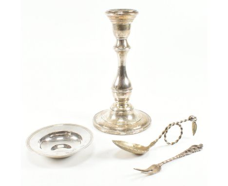 A collection of hallmarked silver and 830 silver tableware. To include a hallmarked silver candlestick The candlestick being 