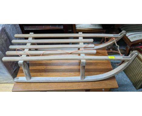 A vintage wooden sledge Location: 