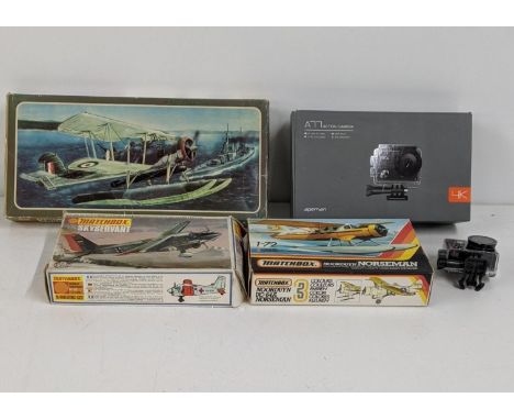 An Apeman A77 4K Action camera with box, together with three model kits A/F, to include Matchbox Skyservant 1-72nd scale kit 
