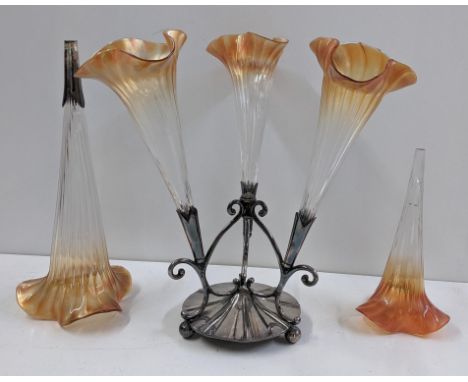 An Art Nouveau silver plated three branch epergne, with spare flute, A/F central branch broken 