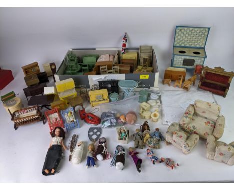 A quantity of vintage, wooden, plastic, fabric and metal dolls house furnishings and dolls, to include a suite of green paint