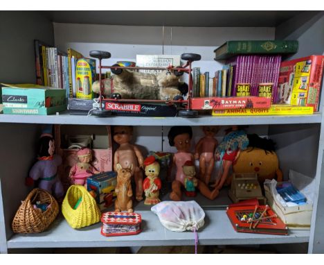 A mixed lot of vintage toys and children's books to include a Lines Bros (Ireland) Ltd soft toy donkey pull-along toy, board 