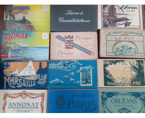 A quantity of souvenir pictorial postcard albums to include Cairo, Bruges and Southsea, together with an album of early 20th 