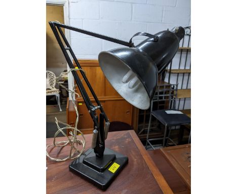 A Herbert Terry 1227 black painted, angle-poise lamp, on a stepped square base, Location: 