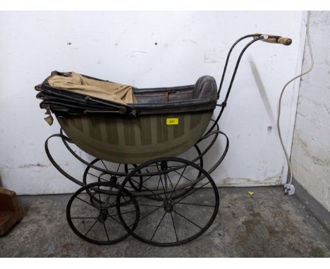 A Sillers vintage pram, painted wooden carriage, black leather interior and hood, on a wrought iron frame and four wheels, Lo