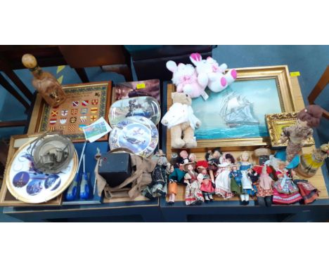 A mixed lot to include. collectors plates, a Concorde wall plate, mixed pictures, tools, dolls of the world, modern stuffed t
