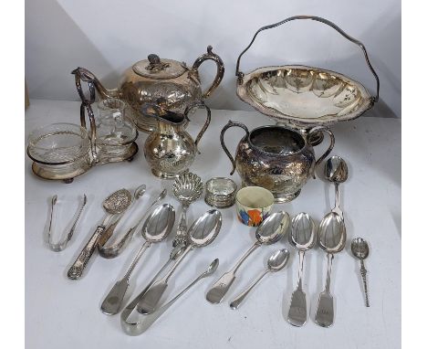 A mixed lot to include a Clarice Cliff salt pot, together with mixed silver plate to include a three piece tea service, napki