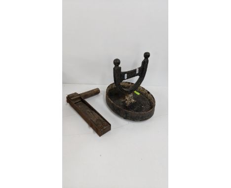A 19th century cast iron boot scraper and a vintage rattle, Location: 