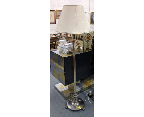 A 1930s chrome standard lamp with a height adjustable column. 