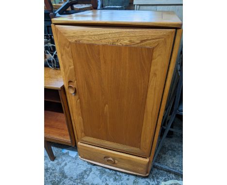 An Ercol Windsor blonde elm 1073 stereo cabinet with a hinged top and door, Location: 