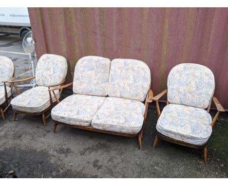 A mid 20th century Ercol two seater sofa and two matching armchairs, Location: Blue Con 