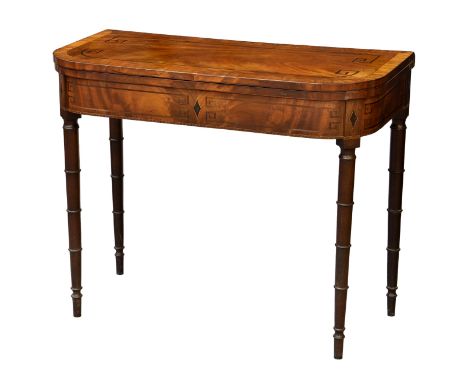 A George IV inlaid and cross banded mahogany D-shaped card table, the kingwood cross banded top inlaid with ebony stringing a