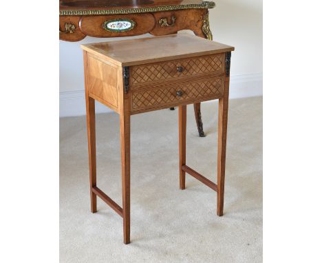 A French two drawer walnut and parquetry work table, first half 20th century, the quarter veneered over two drawers with latt