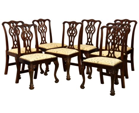 A set of eight George III style mahogany chairs, Victorian, in the country Chippendale style, the foliate and banner carved y