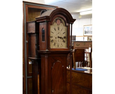 An unusual 19th century Channel Islands mahogany longcase clock, the 8 day bell strike movement fronted by a painted arched R