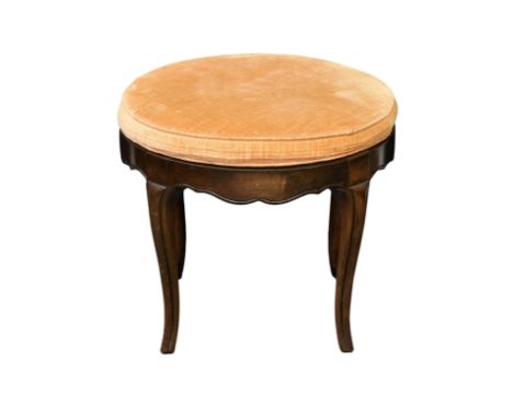 A French Hepplewhite style circular revolving footstool, first half 20th century, in carved beech wood, 19in. (48.25cm.) diam