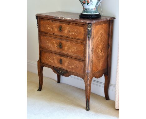 A 19th century French marble, kingwood, rosewood, marquetry and ormolu commode,&nbsp;the original dark pink and grey mottled 