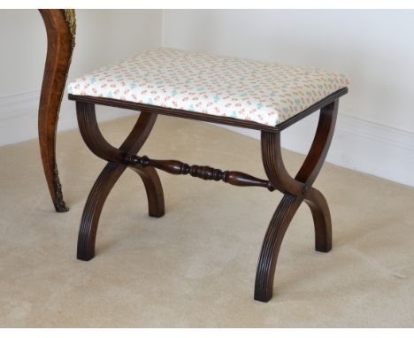 A Regency style x-frame stool, early 20th century, with reeded frame and reupholstered seat, 22½ x 16½in. (57.2 x 42cm.), 19¼