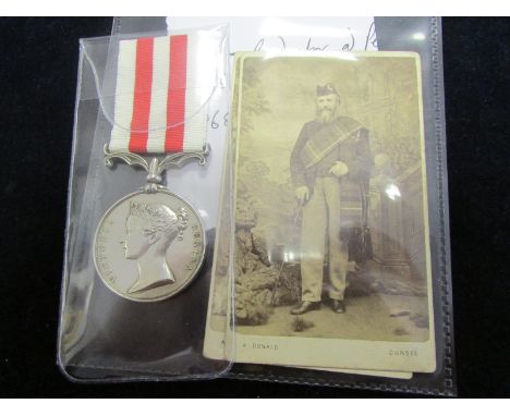 Indian Mutiny Medal, no bar, named J. Smith Condr Ordce Dept. With two photos. Served with the Bengal Ordnance Dept, served a