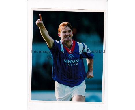 FOOTBALL PRESS PHOTOS 1980'S &amp; 1990'S    Over 60 B/W and colour photos with stamps on the reverse featuring Scottish club