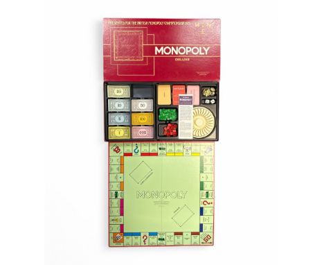 Monopoly Deluxe: Presented For The British Monopoly Championship 1975 limited edition Monopoly set. Unchecked but appears com