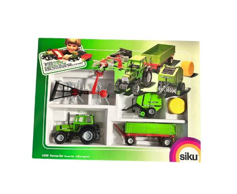 1990s Siku 1/32nd scale Farmer 5-piece Set No. 6350, generally excellent in excellent to good plus window box, with Deutz Fah