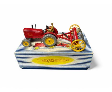 Dinky Massey Harris Tractor and hay rake No. 27AK, generally excellent to good plus in good plus Dinky Toys stripe lift-off l