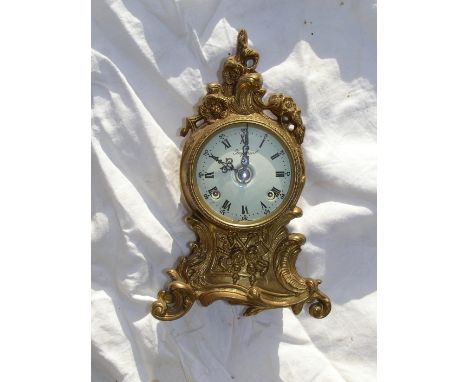 A 20thC Imperial brass cased striking mantel clock