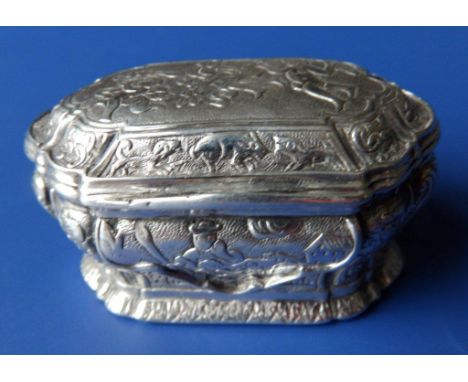 An 18thC continental silver snuff box, of rectangular bombe form with chased & cast decoration of figures and animals, 2.25” 