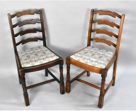 A Set of Six Ladder Back Dining Chairs 