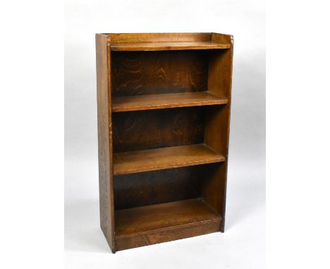 An Edwardian Oak Three Shelf Galleried Waterfall Bookcase, 45cms Wide 