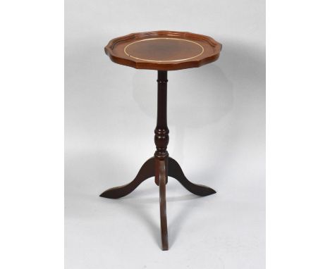 A Modern Tripod Wine Table, 31cms Diameter 