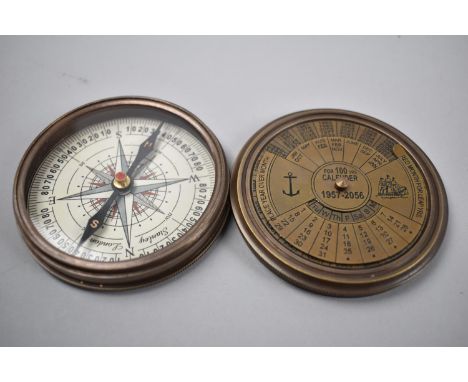 A Reproduction Circular Brass Cased Compass, Lid Incorporating a 100 Year Calendar 1957-2056, 7.5cms Diameter 