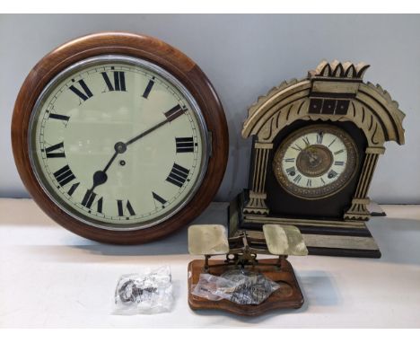 An early 20th century dial clock with a painted dial, an American mantel clock and letter scales with weightsLocation: 