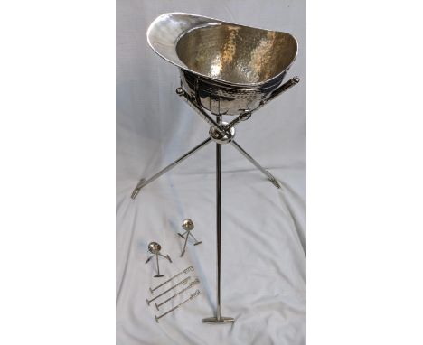 A Polo helmet wine cooler and stand together with a nickel-plated aluminium cooler, two candlesticks along with four silver p