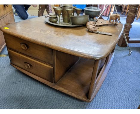 A vintage Ercol 'Pandora' stained elm coffee tableLocation: 