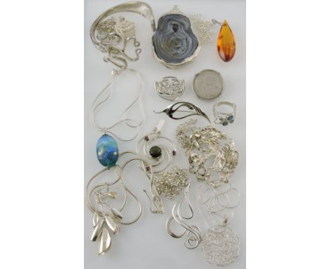A quantity of white metal and silver jewellery including a table fork converted to a bangle.