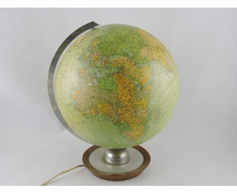 A 1950s JRO illuminated terrestrial globe on nickel mounted dished wood stand.