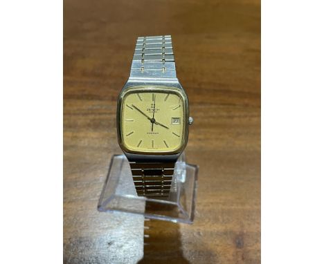 This watch is a super thin everyday watch with a gold Dial and bezel on a steel bracelet original to the watch from the 1970s