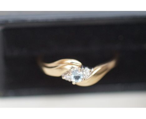 9ct Gold Ring set with Light Blue Stone &amp; 2 Diamonds (Boxed)