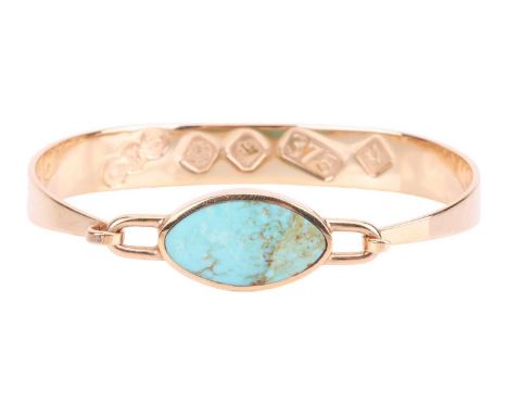 A turquoise-set bangle in 9ct yellow gold, tension clamp opening bracelet featuring a navette-shaped turquoise panel, to a ta